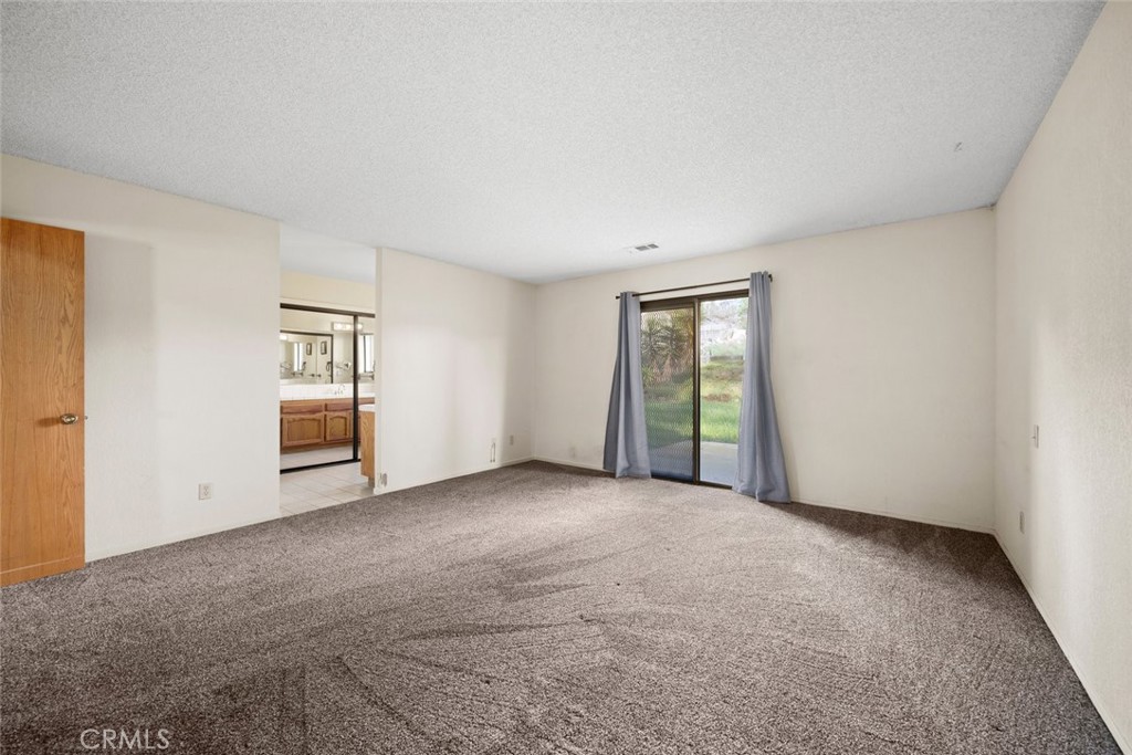 261 Hazel Lane Nipomo, CA 93444 - Photo 15 of 68 an empty room with windows