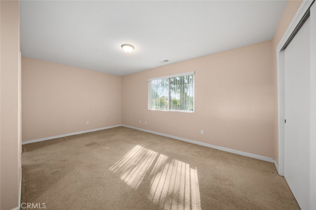 261 Hazel Lane Nipomo, CA 93444 - Photo 42 of 68 an empty room with windows