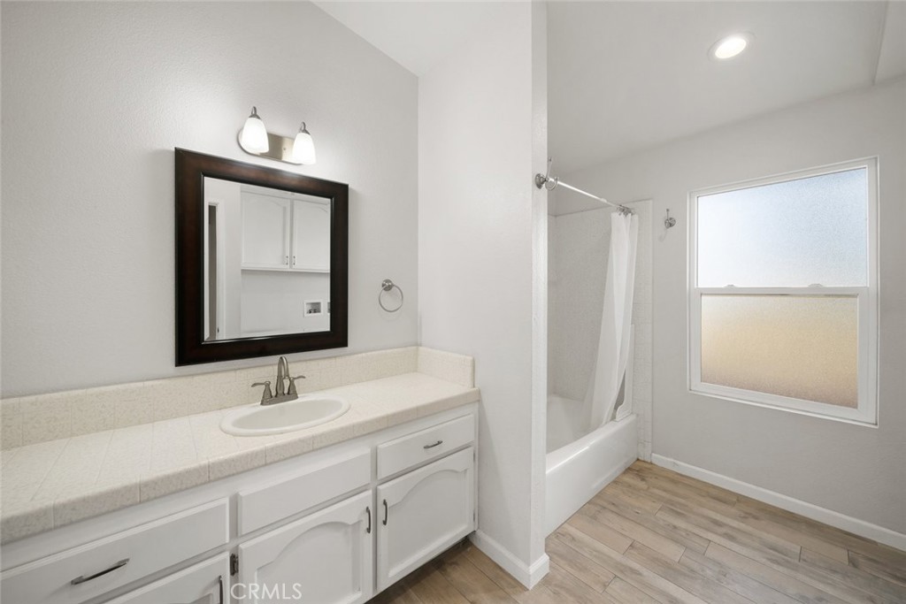 261 Hazel Lane Nipomo, CA 93444 - Photo 48 of 68 a bathroom with a double vanity sink mirror and