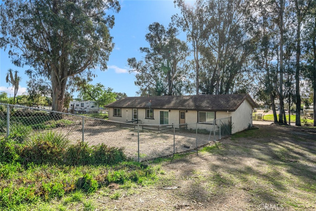 261 Hazel Lane Nipomo, CA 93444 - Photo 57 of 68 a view of a house with a yard and large tree