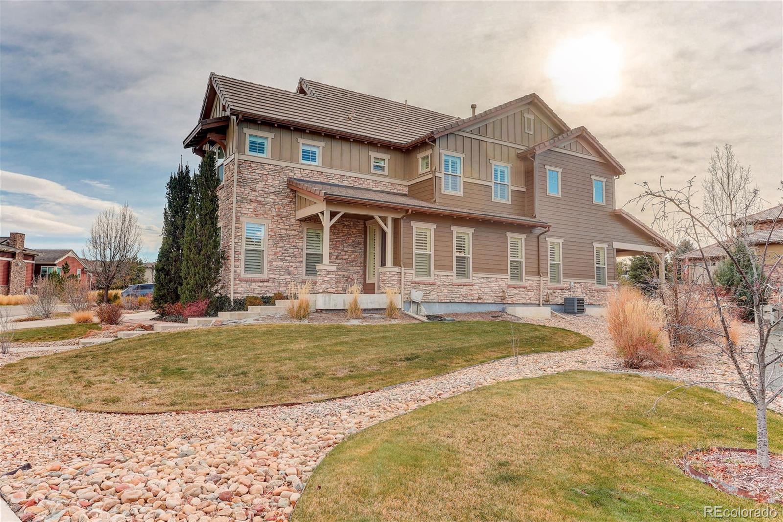 10544 Soulmark Way Highlands Ranch, CO 80126 - Photo 38 of 50 a view of a house with swimming pool