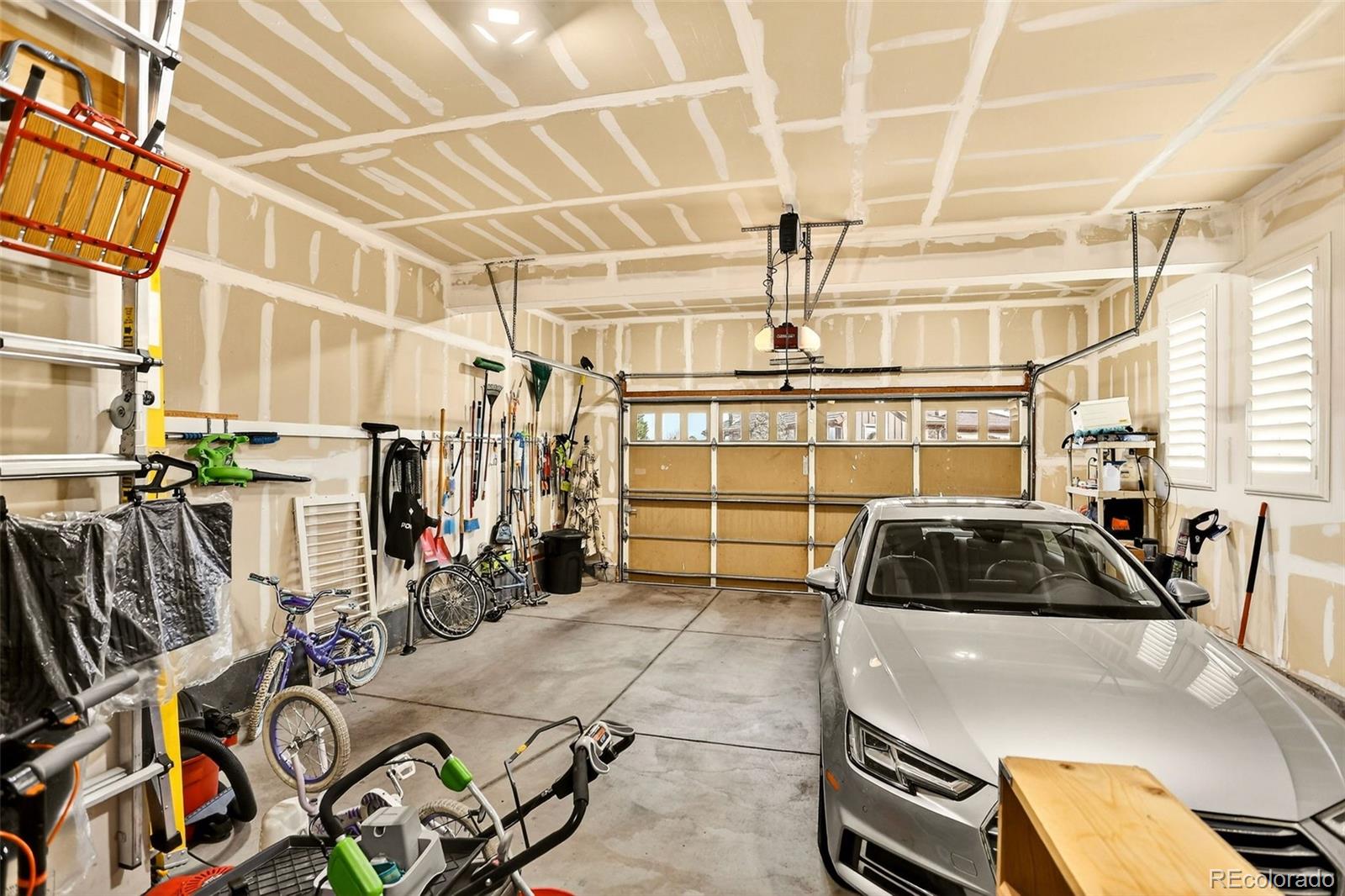10544 Soulmark Way Highlands Ranch, CO 80126 - Photo 42 of 50 a view of a garage with storage