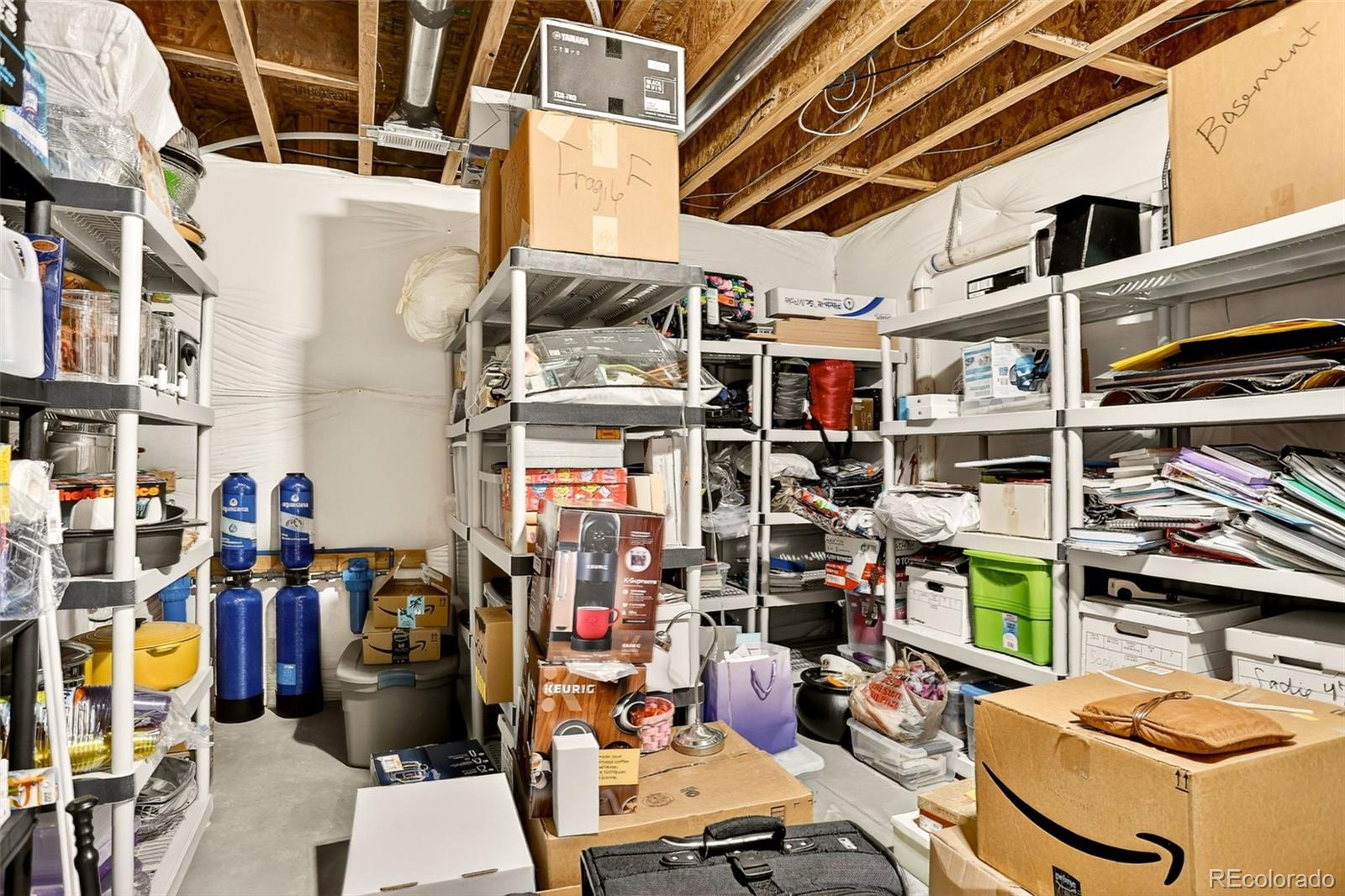 10544 Soulmark Way Highlands Ranch, CO 80126 - Photo 44 of 50 a view of storage and utility room