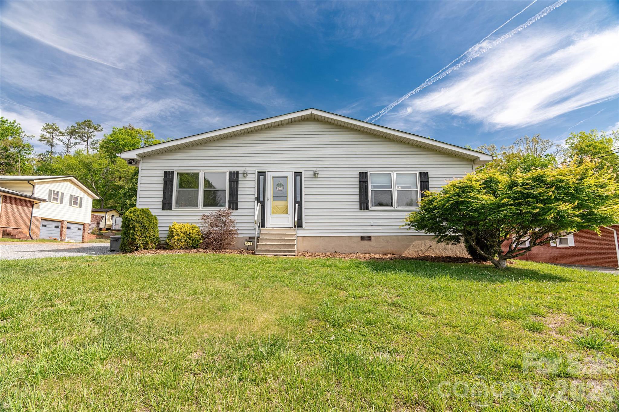 445 Old Caroleen Road Forest City, NC 28043 - Photo 1 of 28 a view of a house with a yard and potted plants
