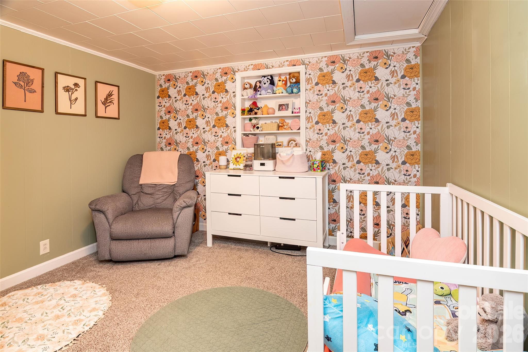 445 Old Caroleen Road Forest City, NC 28043 - Photo 14 of 28 a bedroom with a bed and a couch