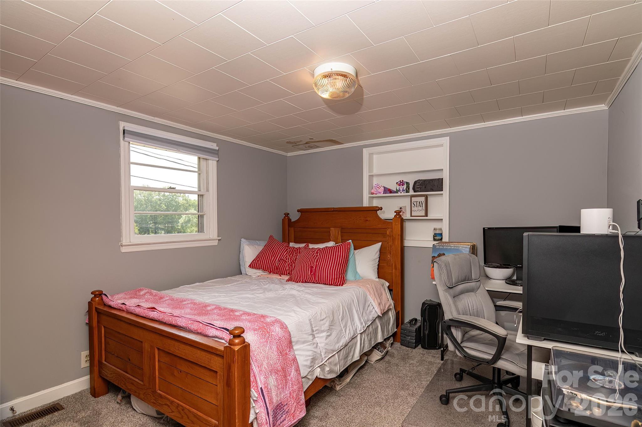 445 Old Caroleen Road Forest City, NC 28043 - Photo 19 of 28 a bedroom with a bed and a window