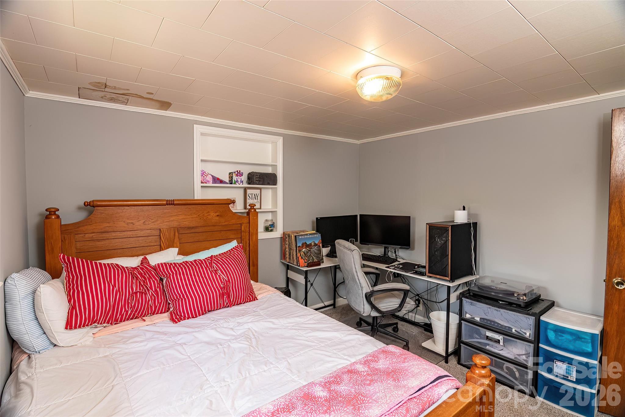 445 Old Caroleen Road Forest City, NC 28043 - Photo 20 of 28 a bedroom with a bed and a tv on the dresser