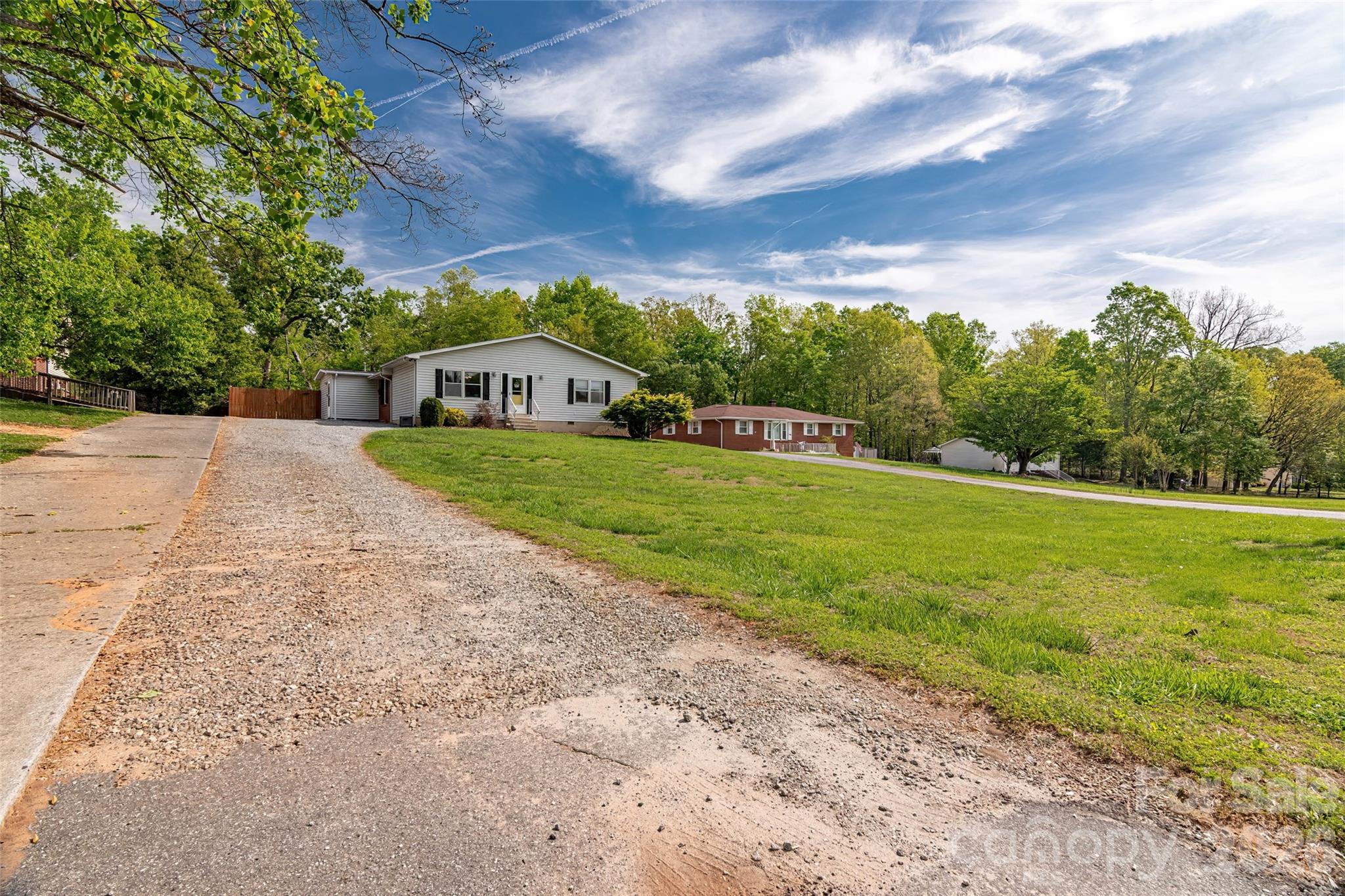 445 Old Caroleen Road Forest City, NC 28043 - Photo 24 of 28 a view of a garden with a building in the background