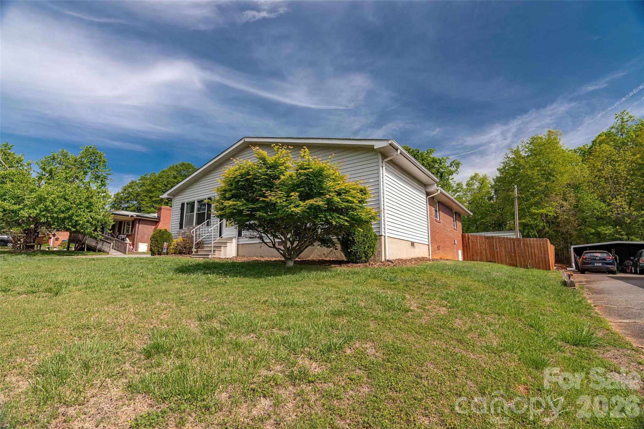 445 Old Caroleen Road Forest City, NC 28043 - Photo 26 of 28 a view of a house with a yard