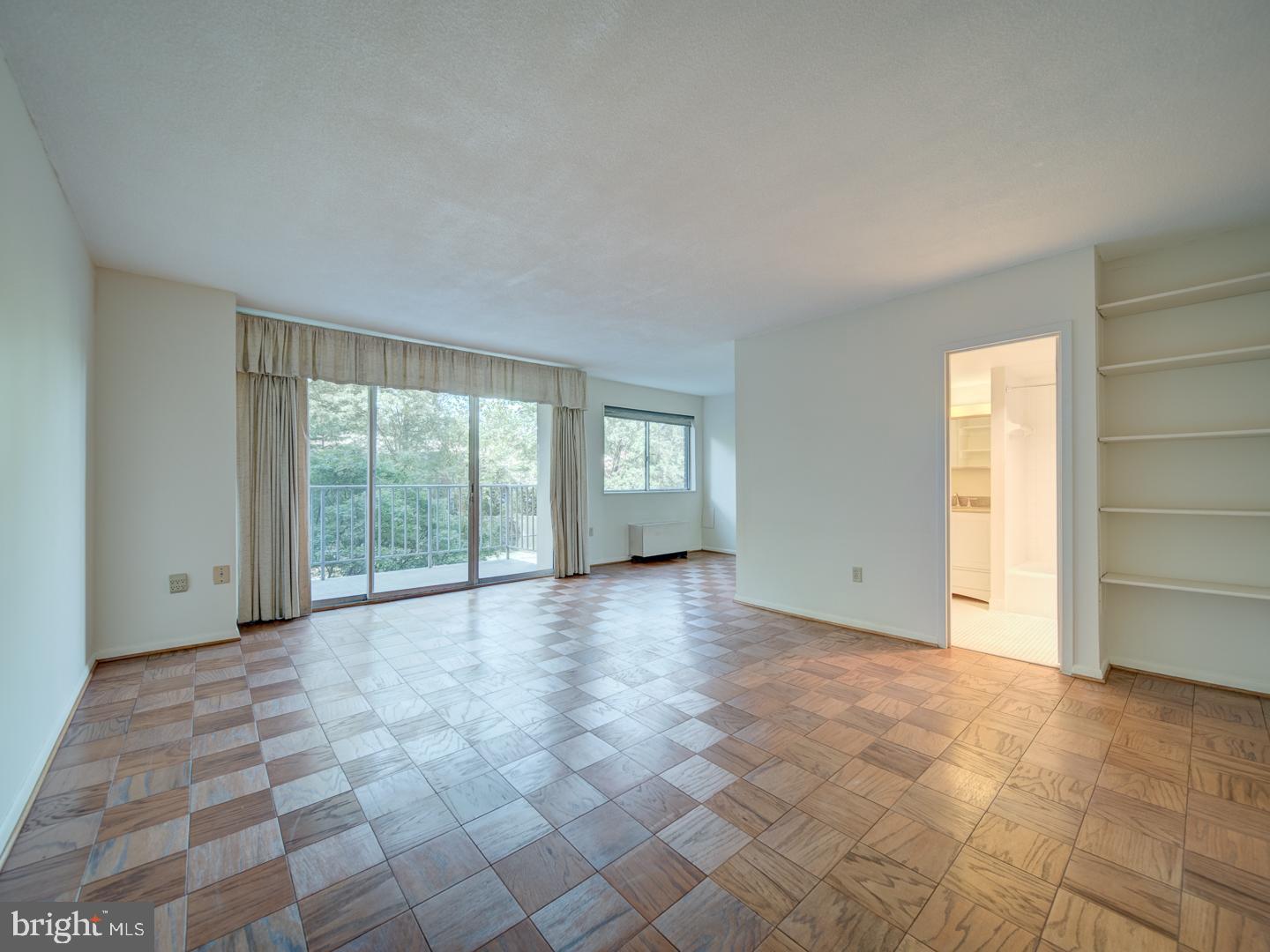 2059 Huntington Avenue, Unit 300 Alexandria, VA 22303 - Photo 11 of 30 a view of an empty room with a window