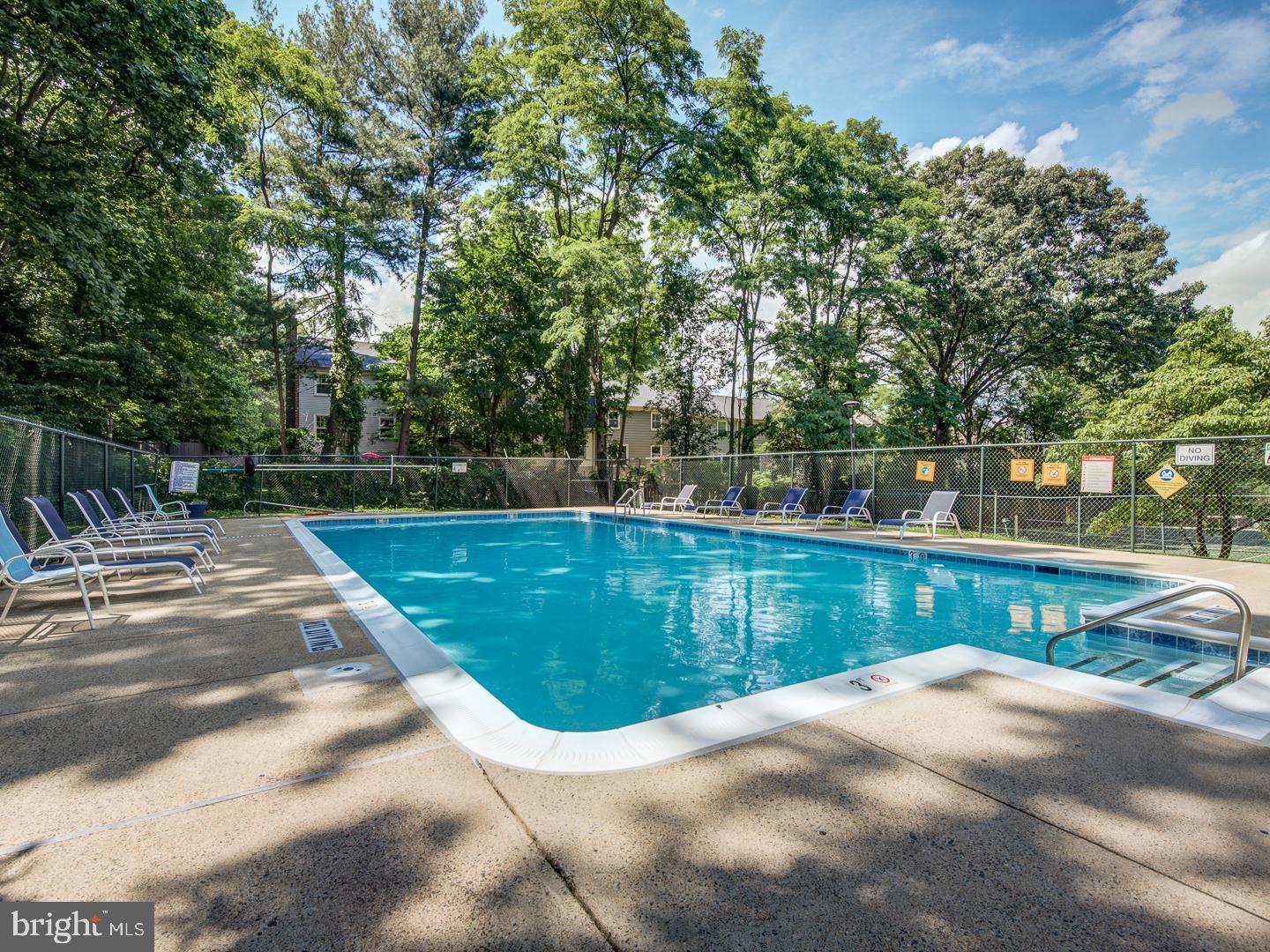 2059 Huntington Avenue, Unit 300 Alexandria, VA 22303 - Photo 27 of 30 a view of a swimming pool with a yard