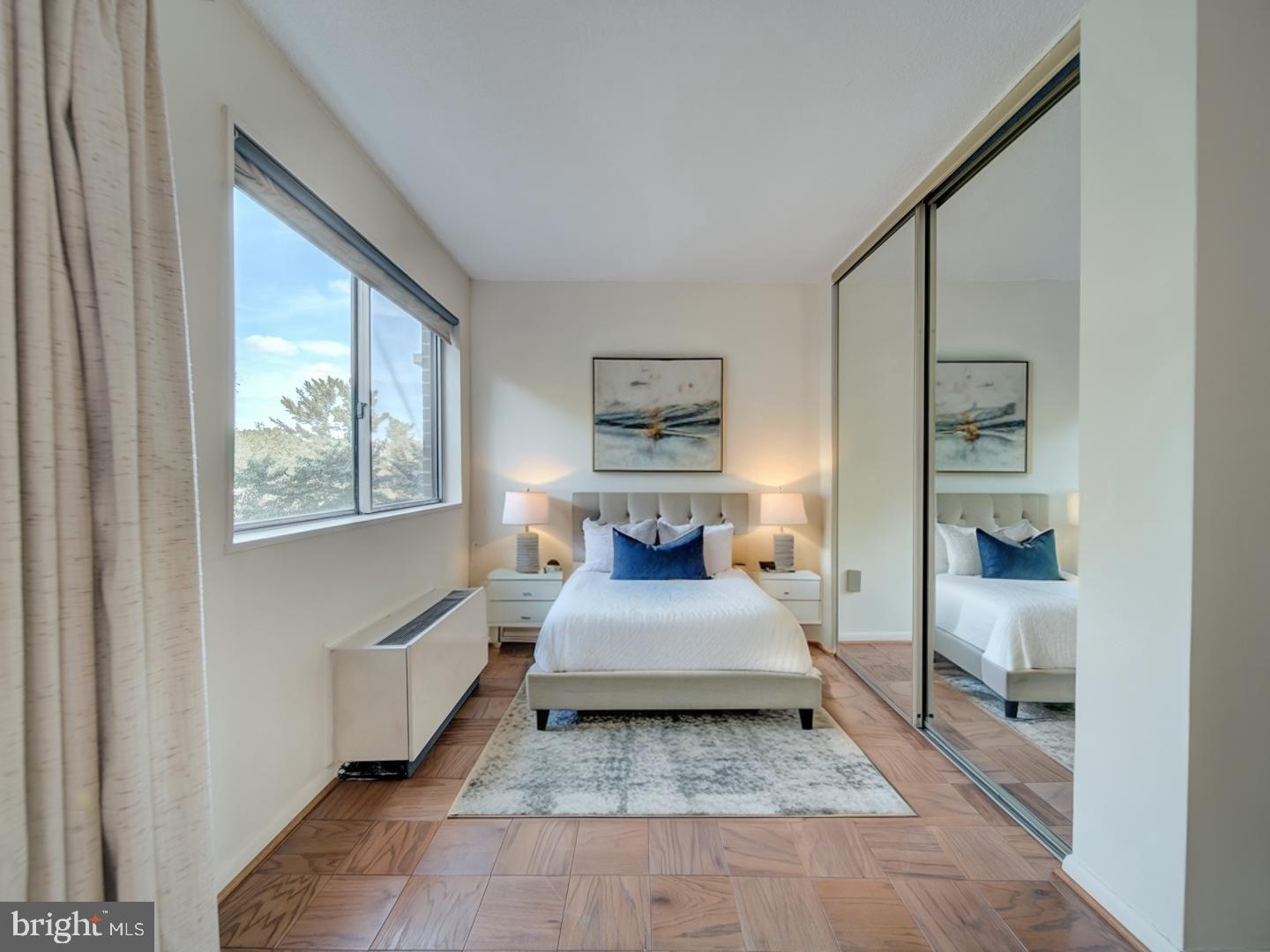 2059 Huntington Avenue, Unit 300 Alexandria, VA 22303 - Photo 5 of 30 a bedroom with a bed and window