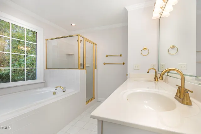 a bathroom with a bathtub and a sink