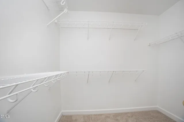a view of small space with racks on the wall