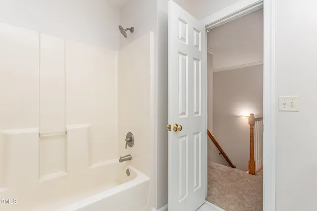 a view of a balcony with wooden floor