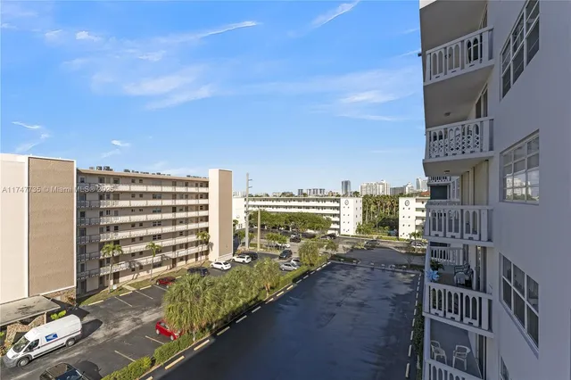 a view of a city with tall buildings
