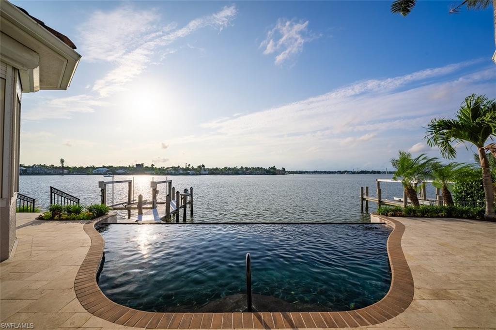 1942 Kingfish Road Naples, FL 34102 - Photo 5 of 43 a view of lake