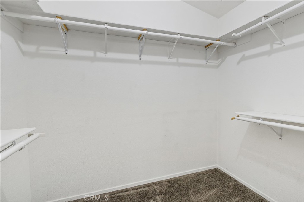 27250 Murrieta Road, Unit 253 Menifee, CA 92586 - Photo 42 of 49 Primary Bedroom Walk-in Closet