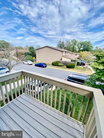 a balcony with a yard