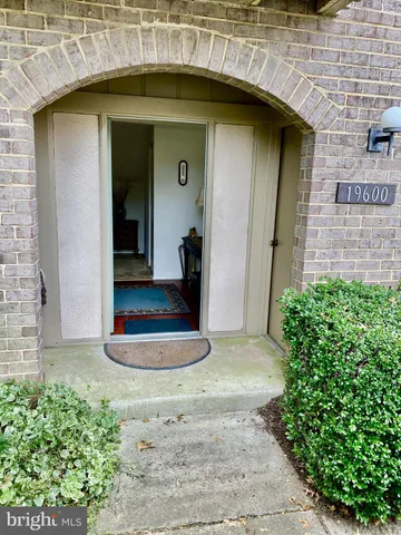 a view of a wooden door of the house