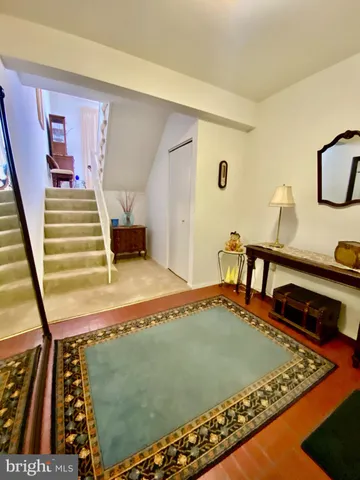 a bedroom with bed and window