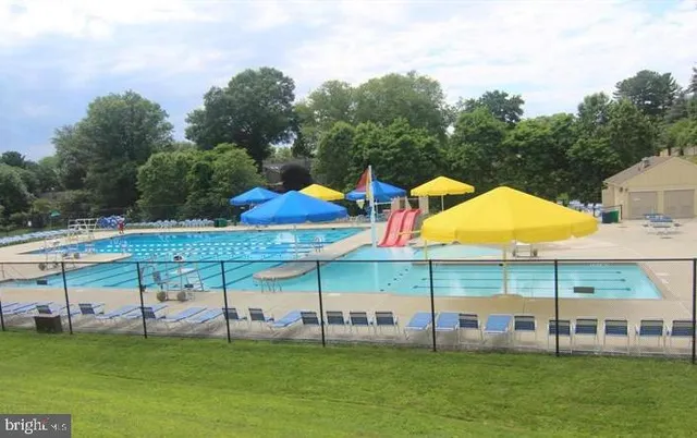 a view of a two chair and an umbrella