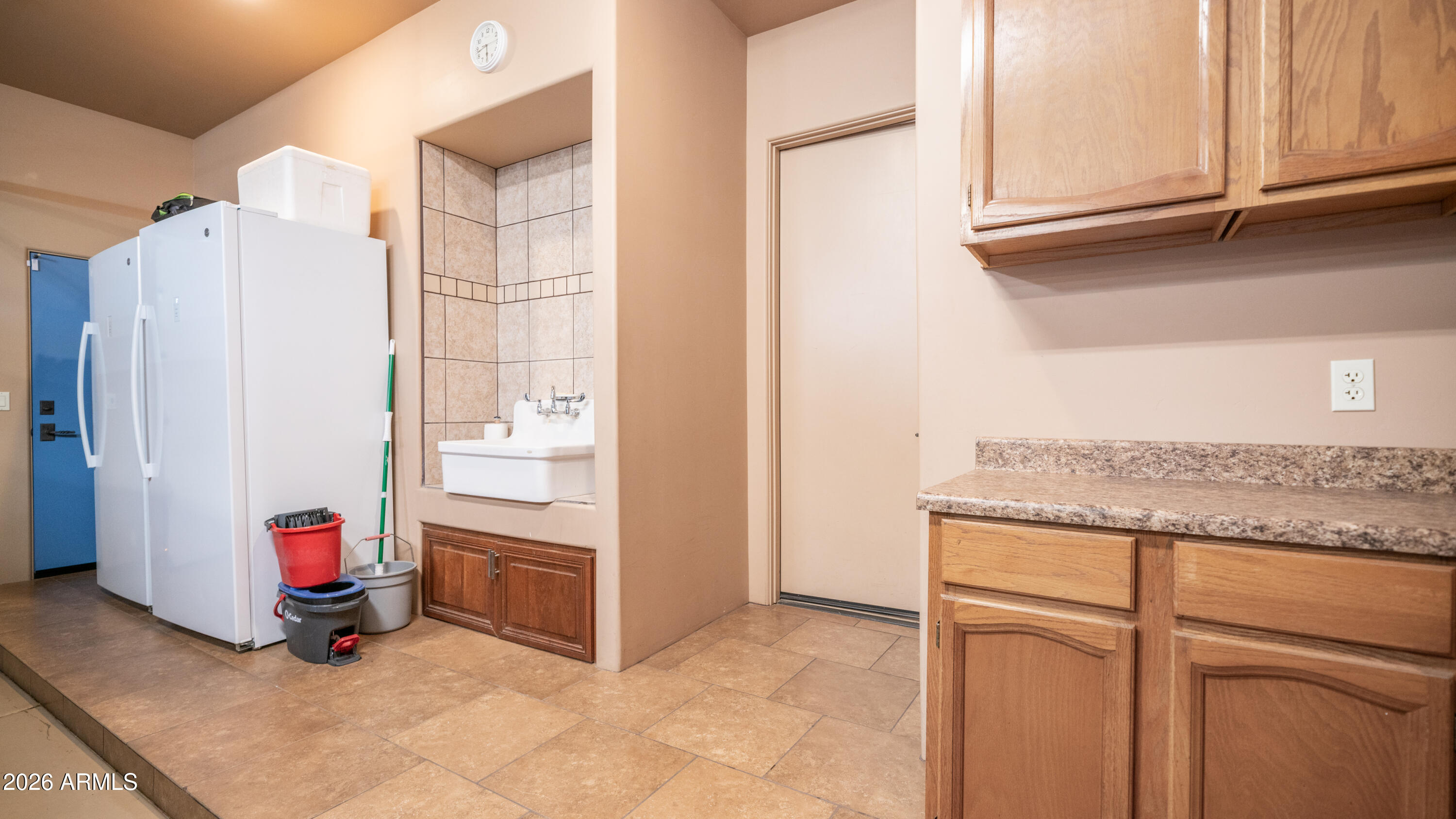 7841 East McDowell Road Mesa, AZ 85207 - Photo 37 of 62 Garage cabinets and counters