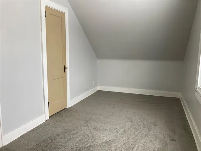 a view of empty room with a window