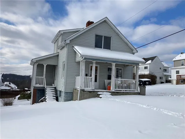 a view of a house with sitting area