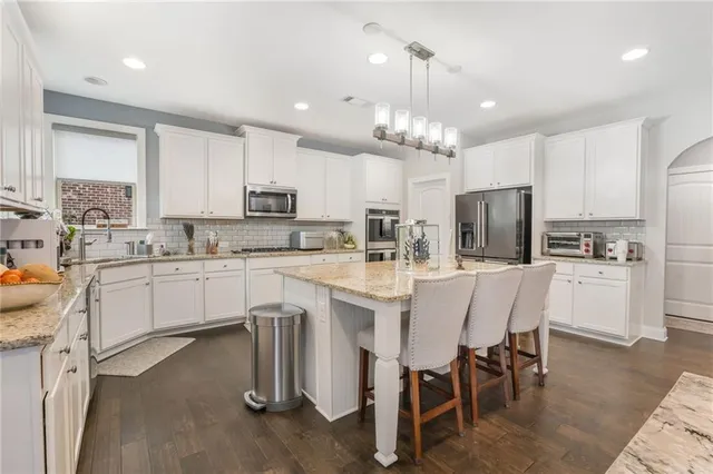 $920,000 | 4450 Woodward Walk Lane, Suwanee, GA 30024