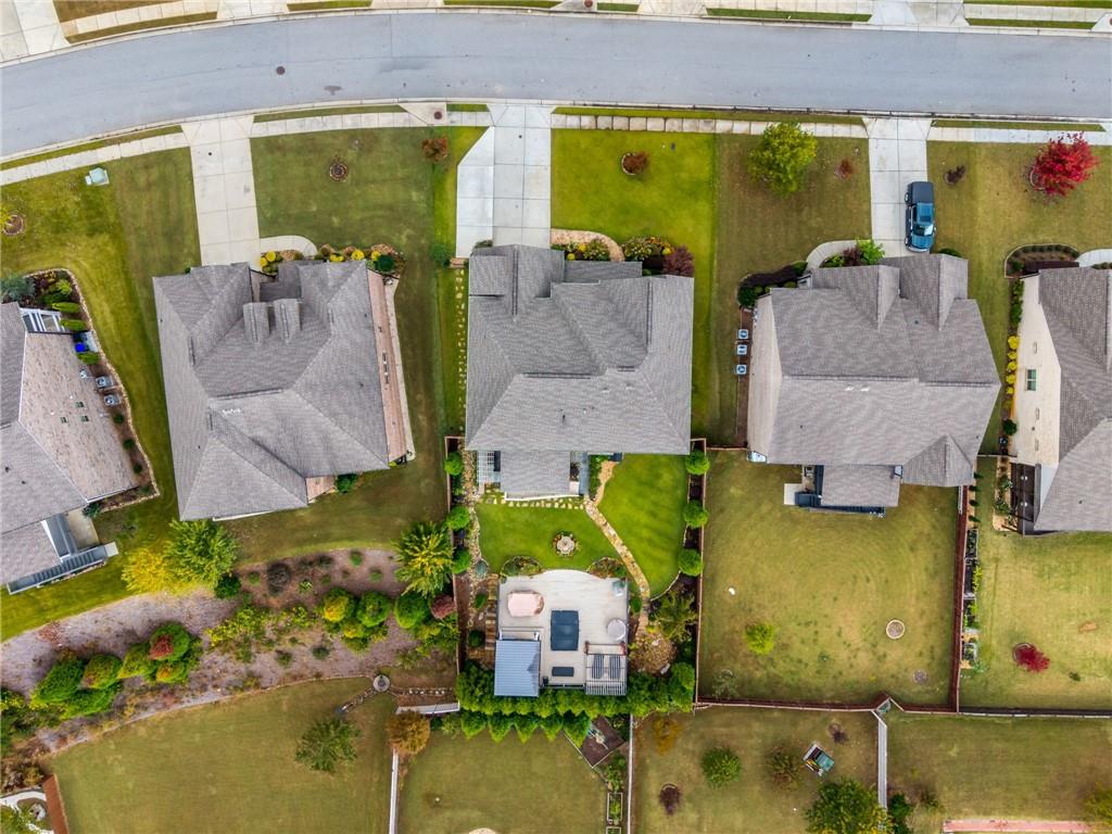 4450 Woodward Walk Lane Suwanee, GA 30024 - Photo 46 of 52 an aerial view of residential houses with outdoor space