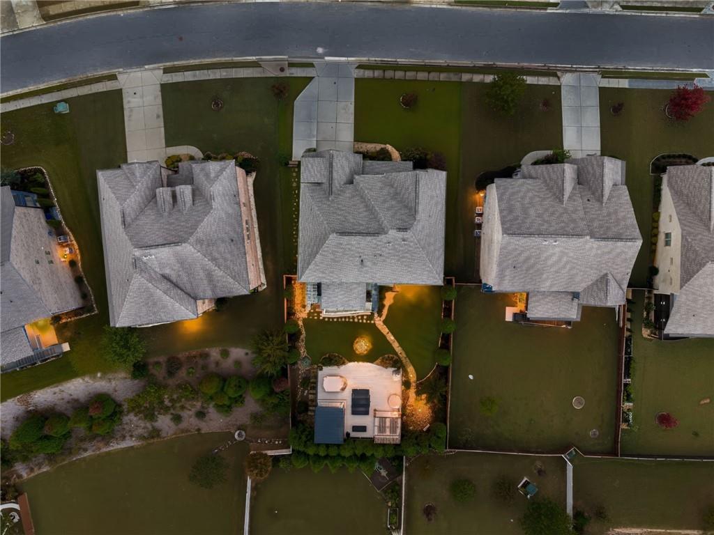 4450 Woodward Walk Lane Suwanee, GA 30024 - Photo 5 of 52 an aerial view of houses with outdoor space