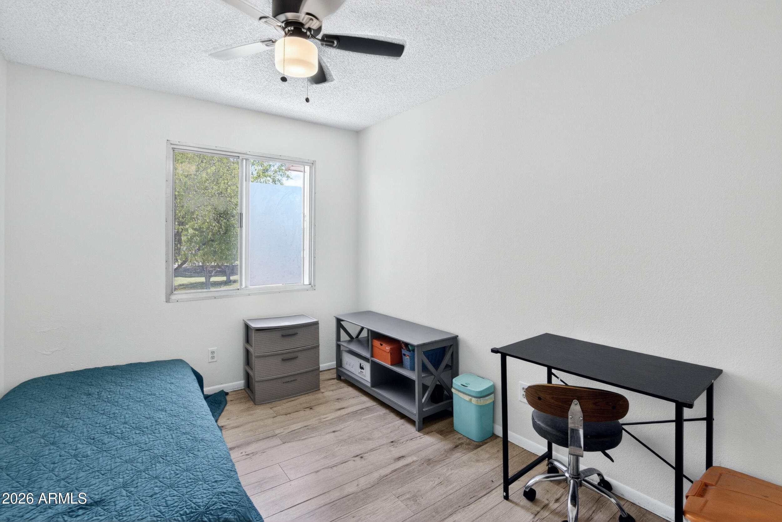5007 South Terrace Road Tempe, AZ 85282 - Photo 22 of 33 a view of a workspace with furniture and a window