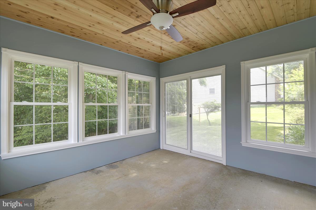 849 Rudder Way Annapolis, MD 21401 - Photo 11 of 26 REcently added sunroom. Light & bright sunroom