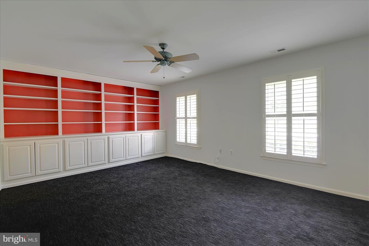849 Rudder Way Annapolis, MD 21401 - Photo 13 of 26 Built in shelving & cabinets, TV or hobby room