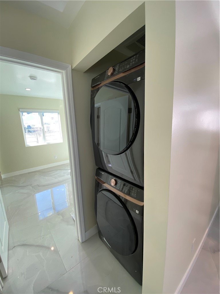18020 Welby Reseda, CA 91335 - Photo 16 of 16 a utility room with dryer and washer