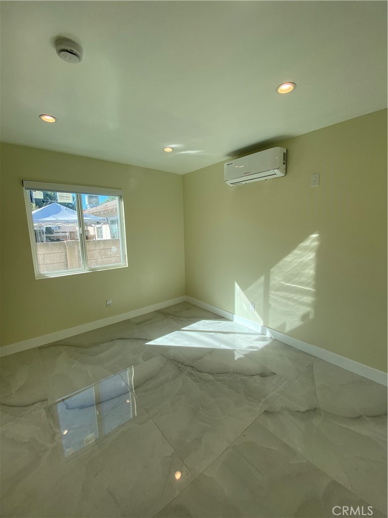 18020 Welby Reseda, CA 91335 - Photo 10 of 16 a view of an empty room with a window