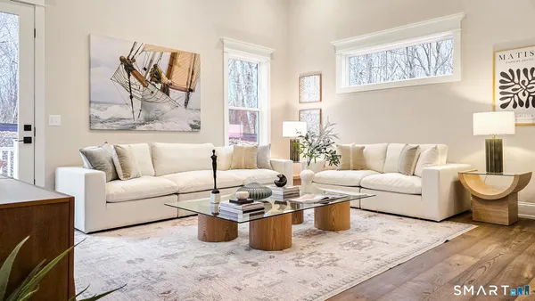 a living room with furniture and a couch