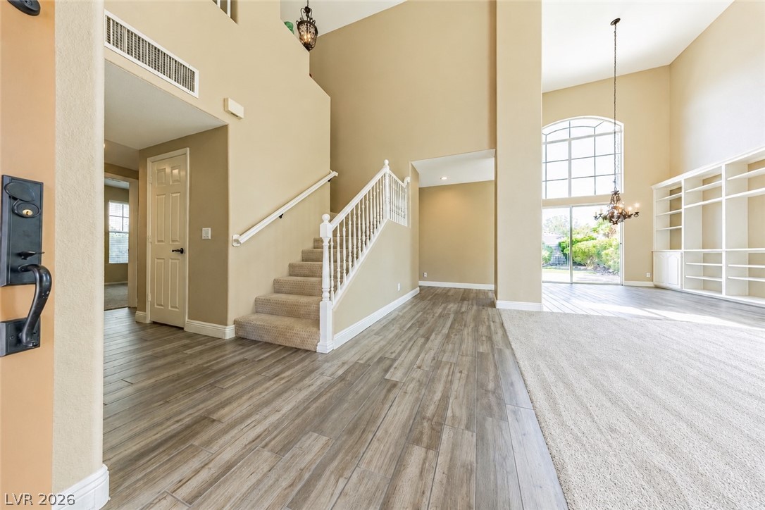 2504 Putting Green Drive Henderson, NV 89074 - Photo 56 of 56 This grand entry features a soaring ceiling and a wide-open floor plan, perfect for welcoming guests.