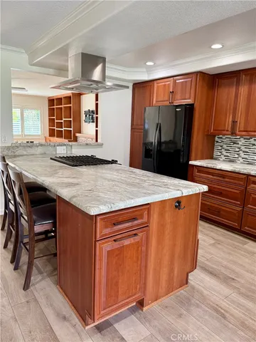a view of a porch with a hanging chair