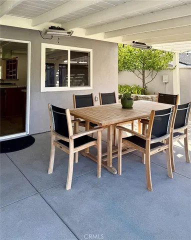 a view of living room with furniture and a fireplace