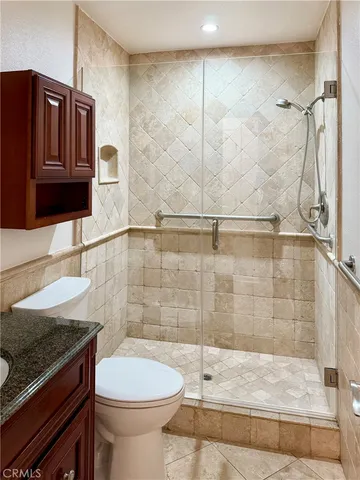 a view of a house with wooden deck