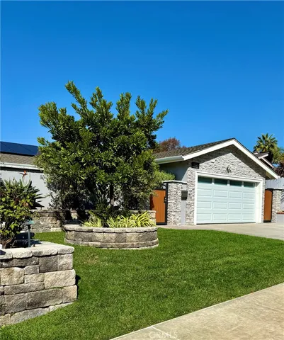 a view of a dining room with furniture and window