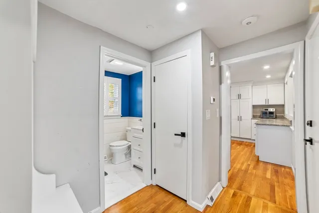 a bathroom with a tub and shower