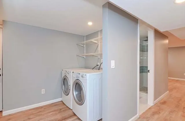 a utility room with dryer and washer