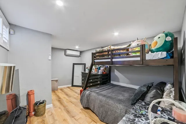 a bedroom with furniture and a bed