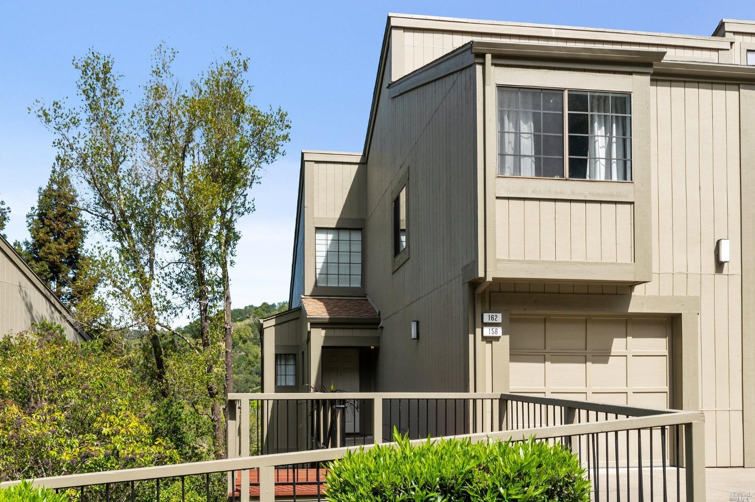 162 Redhawk Road Novato, CA 94949 - Photo 1 of 1 a view of a house with large windows