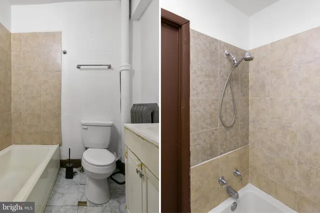 a bathroom with a toilet and shower