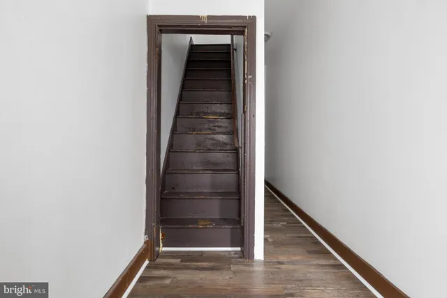 a view of entryway with wooden floor