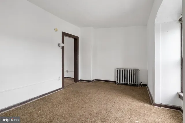 a view of a livingroom with a bench